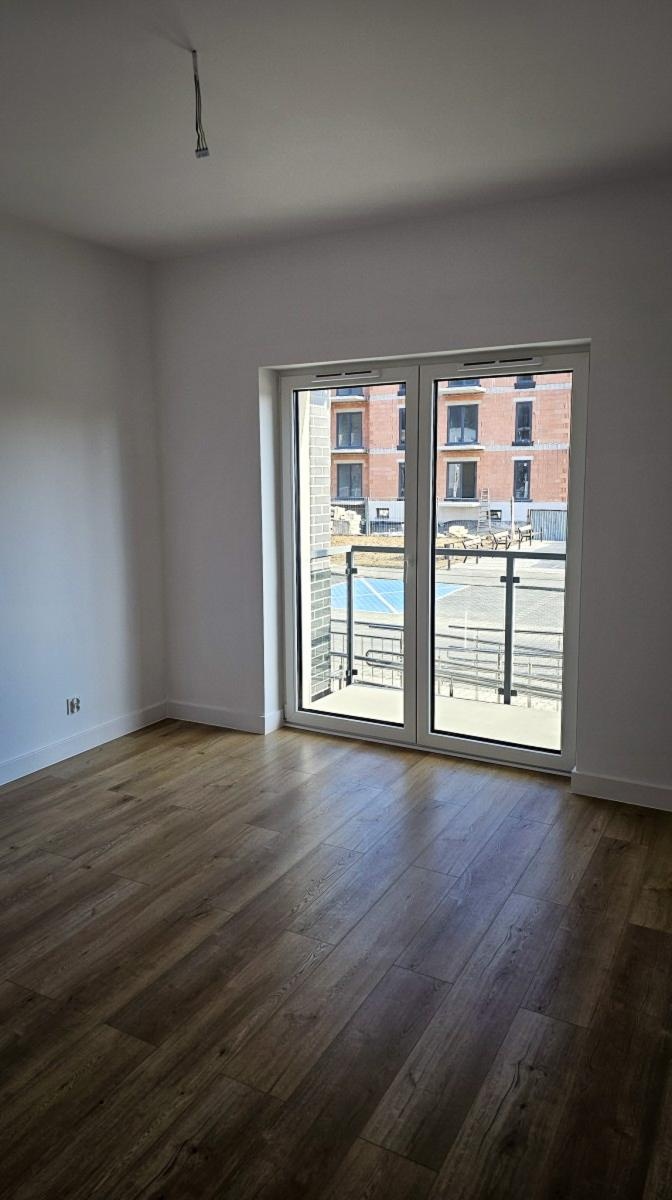 Zdjęcie w galerii na portalu naszraciborz.pl: Lokatorzy odebrali klucze. Pierwszy z dwóch nowych bloków przy Łąkowej gotowy do zamieszkania [FOTO] wiadomości z regionu