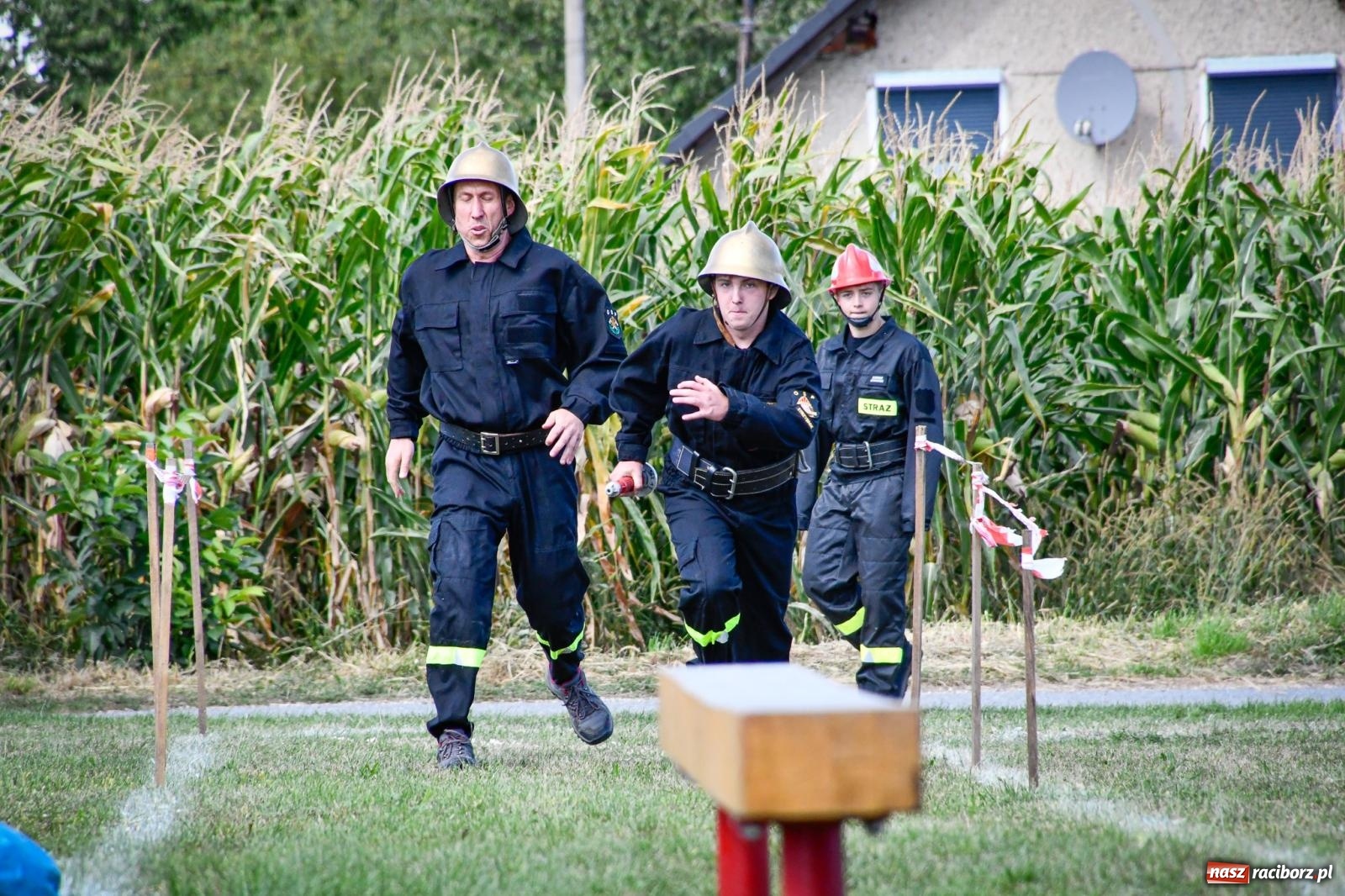 Zdjęcie w galerii na portalu naszraciborz.pl: Gospodarze, Gamów i Rudnik triumfują w gminnych zawodach sportowo-pożarniczych w Sławikowie [FOTO i WIDEO] wiadomości z regionu