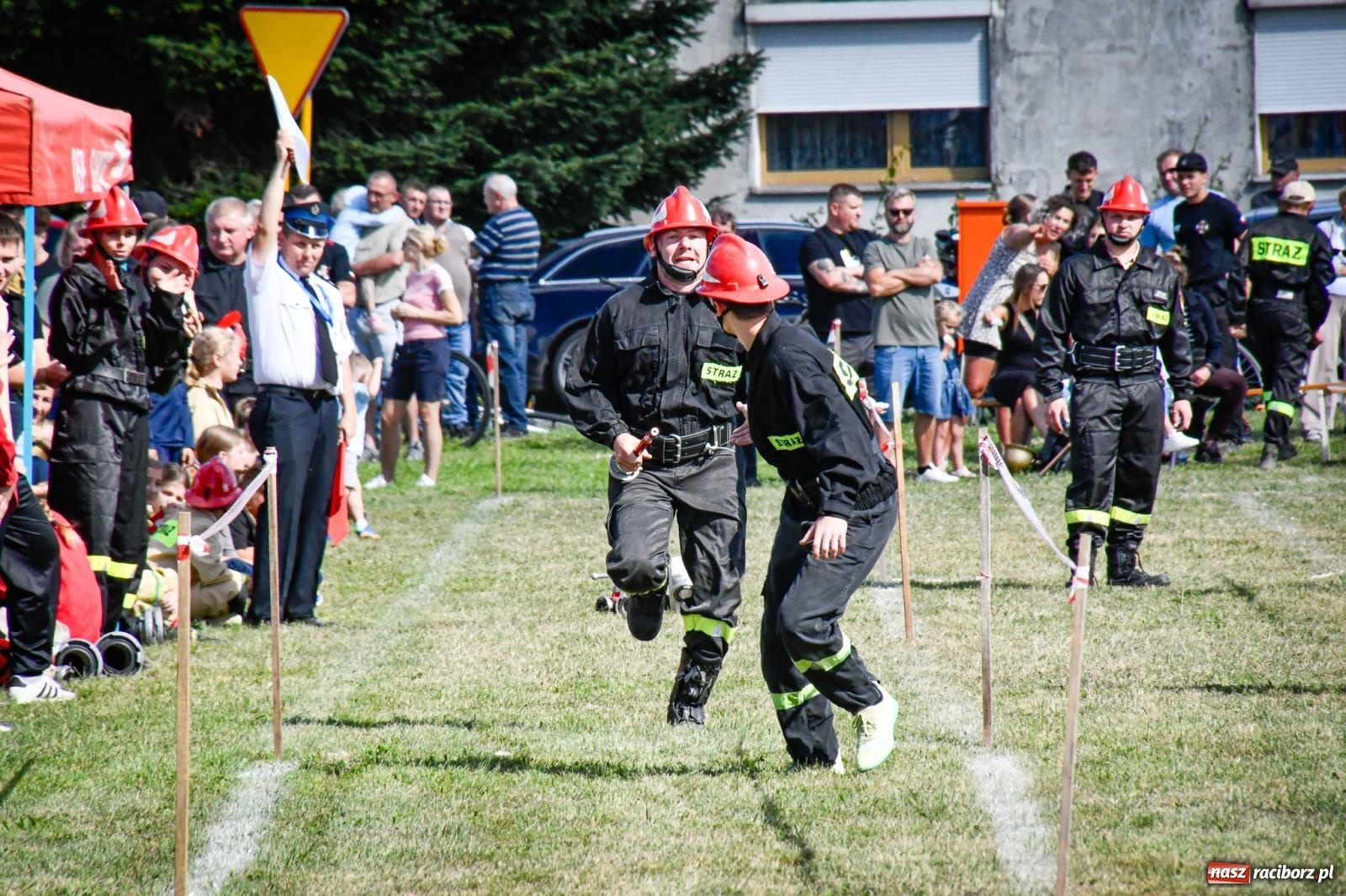Zdjęcie w galerii na portalu naszraciborz.pl: Gospodarze, Gamów i Rudnik triumfują w gminnych zawodach sportowo-pożarniczych w Sławikowie [FOTO i WIDEO] wiadomości z regionu