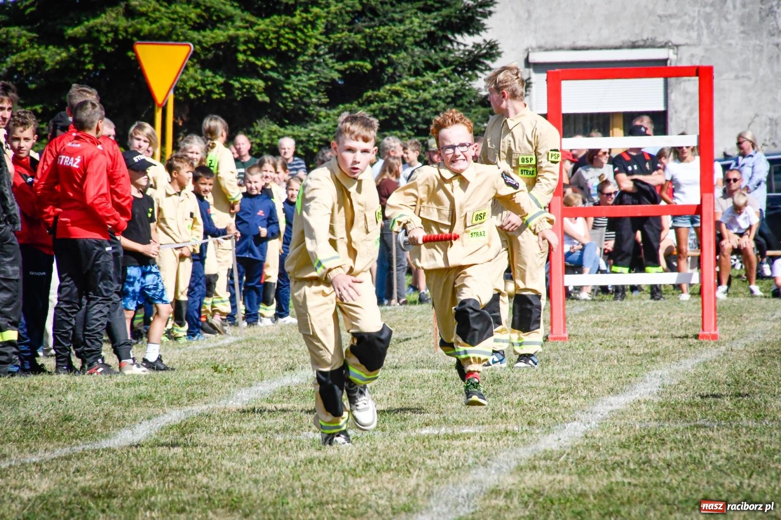 Zdjęcie w galerii na portalu naszraciborz.pl: Gospodarze, Gamów i Rudnik triumfują w gminnych zawodach sportowo-pożarniczych w Sławikowie [FOTO i WIDEO] wiadomości z regionu