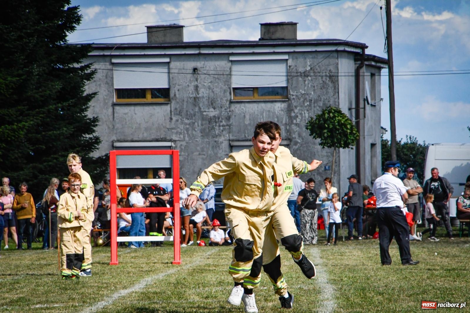 Zdjęcie w galerii na portalu naszraciborz.pl: Gospodarze, Gamów i Rudnik triumfują w gminnych zawodach sportowo-pożarniczych w Sławikowie [FOTO i WIDEO] wiadomości z regionu