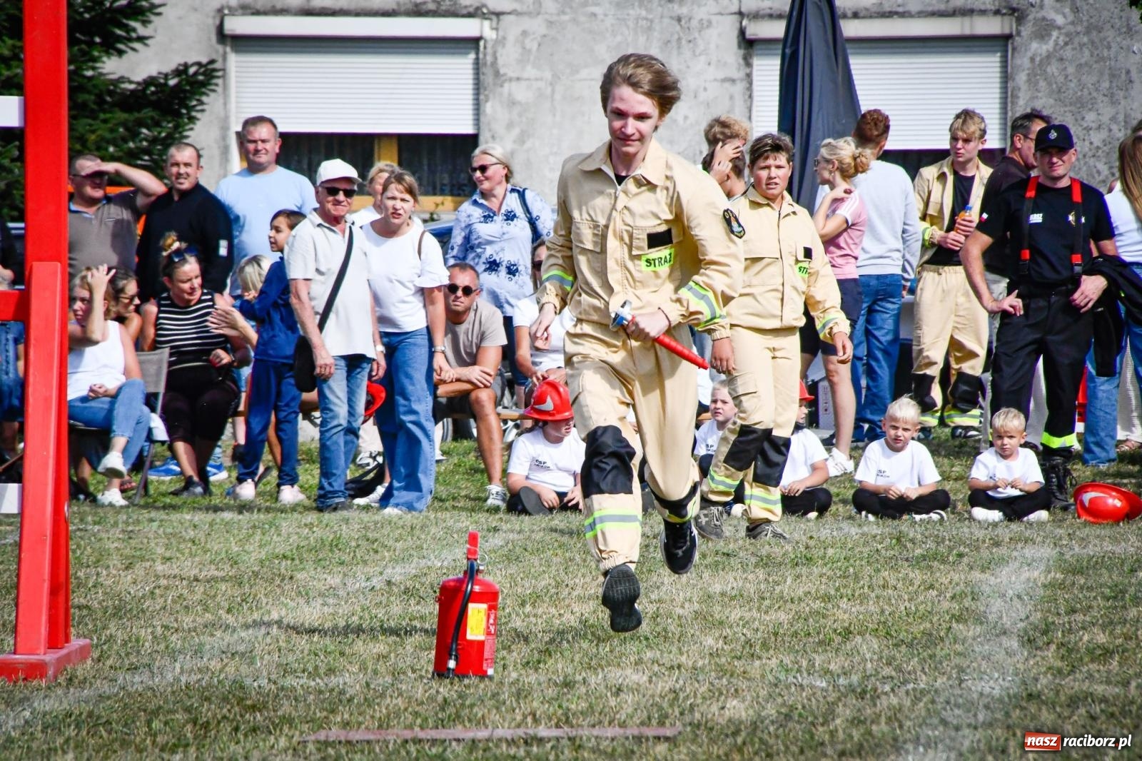 Zdjęcie w galerii na portalu naszraciborz.pl: Gospodarze, Gamów i Rudnik triumfują w gminnych zawodach sportowo-pożarniczych w Sławikowie [FOTO i WIDEO] wiadomości z regionu