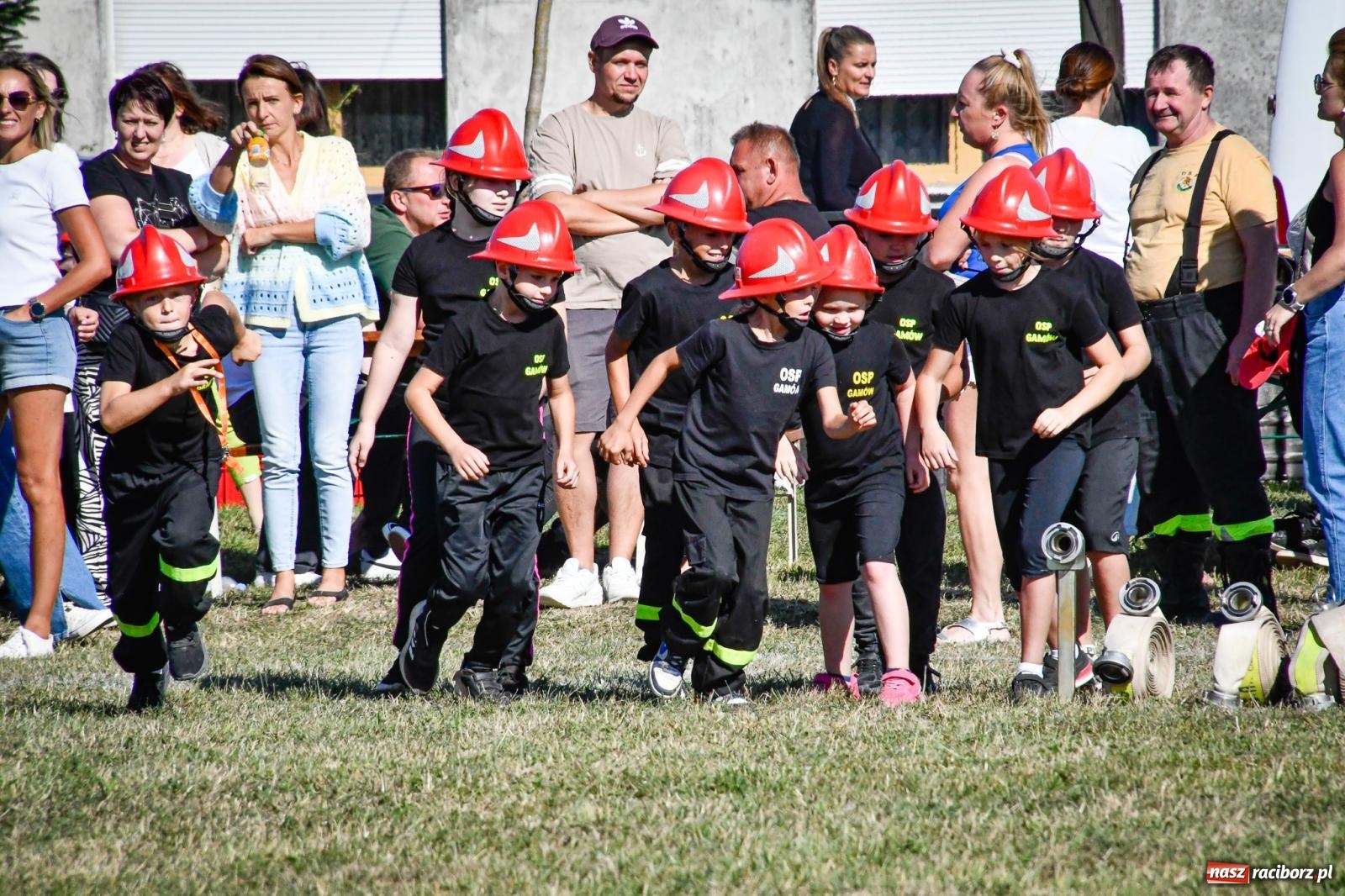 Zdjęcie w galerii na portalu naszraciborz.pl: Gospodarze, Gamów i Rudnik triumfują w gminnych zawodach sportowo-pożarniczych w Sławikowie [FOTO i WIDEO] wiadomości z regionu