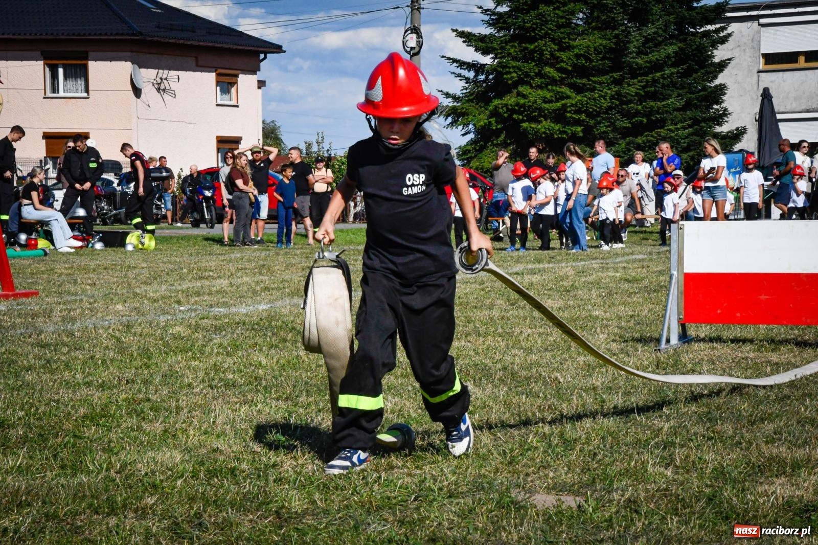Zdjęcie w galerii na portalu naszraciborz.pl: Gospodarze, Gamów i Rudnik triumfują w gminnych zawodach sportowo-pożarniczych w Sławikowie [FOTO i WIDEO] wiadomości z regionu