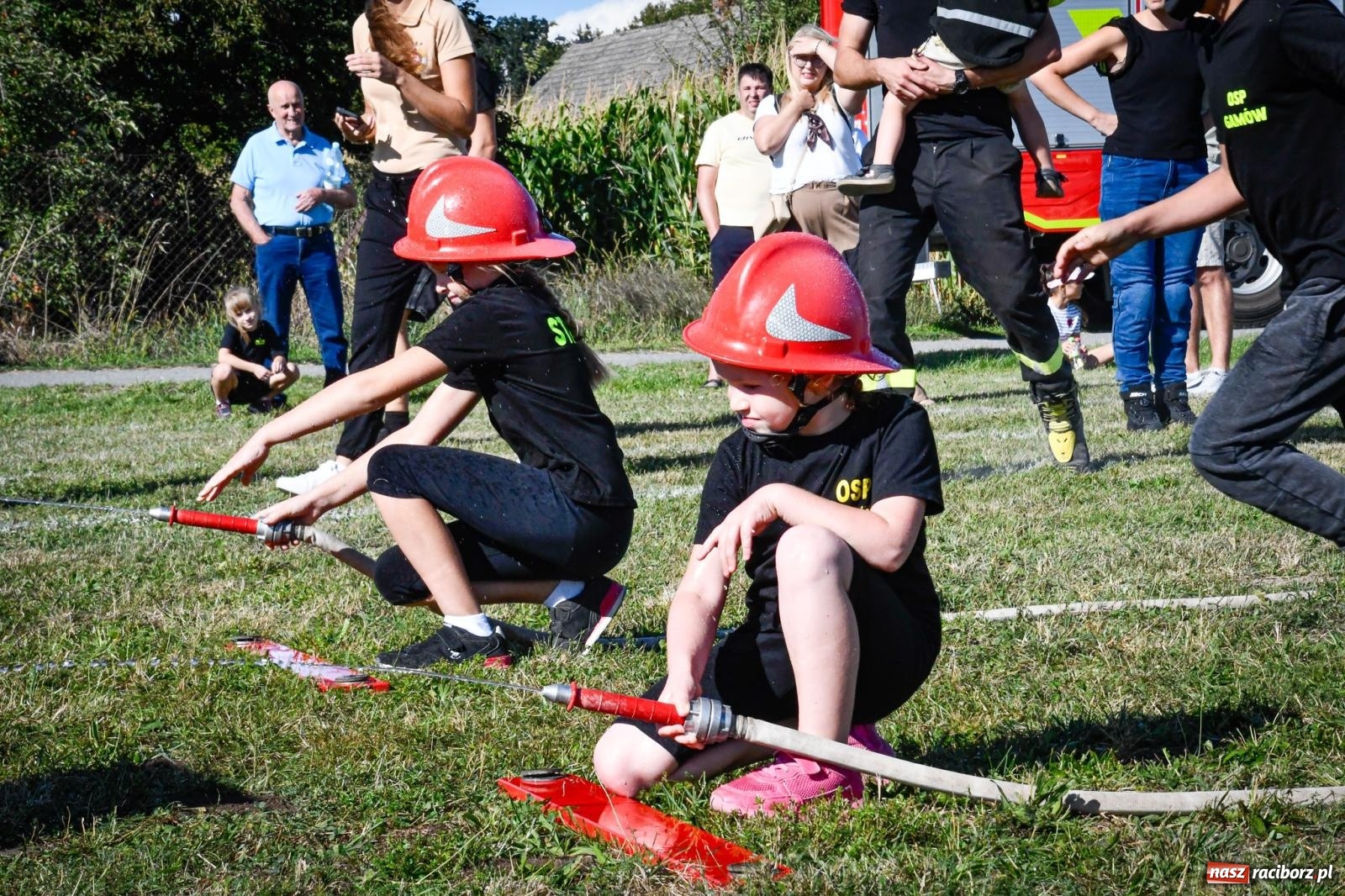 Zdjęcie w galerii na portalu naszraciborz.pl: Gospodarze, Gamów i Rudnik triumfują w gminnych zawodach sportowo-pożarniczych w Sławikowie [FOTO i WIDEO] wiadomości z regionu