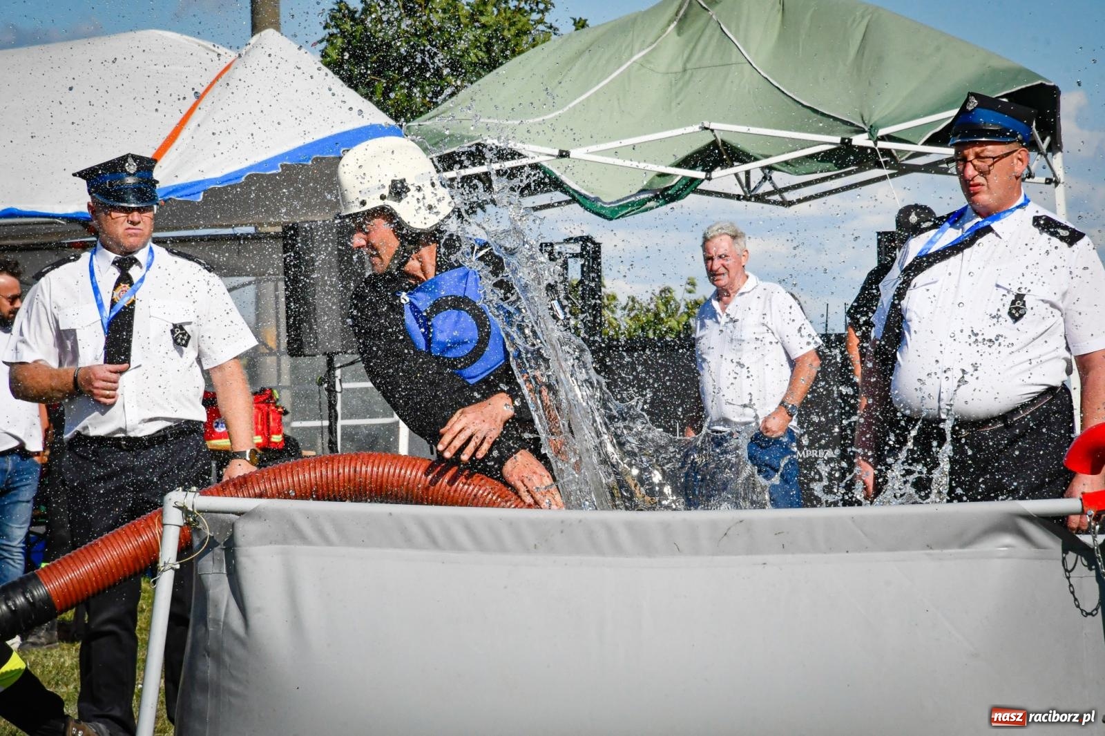 Zdjęcie w galerii na portalu naszraciborz.pl: Gospodarze, Gamów i Rudnik triumfują w gminnych zawodach sportowo-pożarniczych w Sławikowie [FOTO i WIDEO] wiadomości z regionu