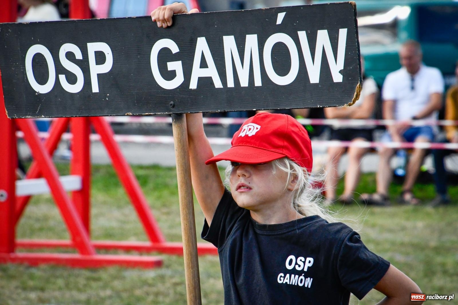 Zdjęcie w galerii na portalu naszraciborz.pl: Gospodarze, Gamów i Rudnik triumfują w gminnych zawodach sportowo-pożarniczych w Sławikowie [FOTO i WIDEO] wiadomości z regionu
